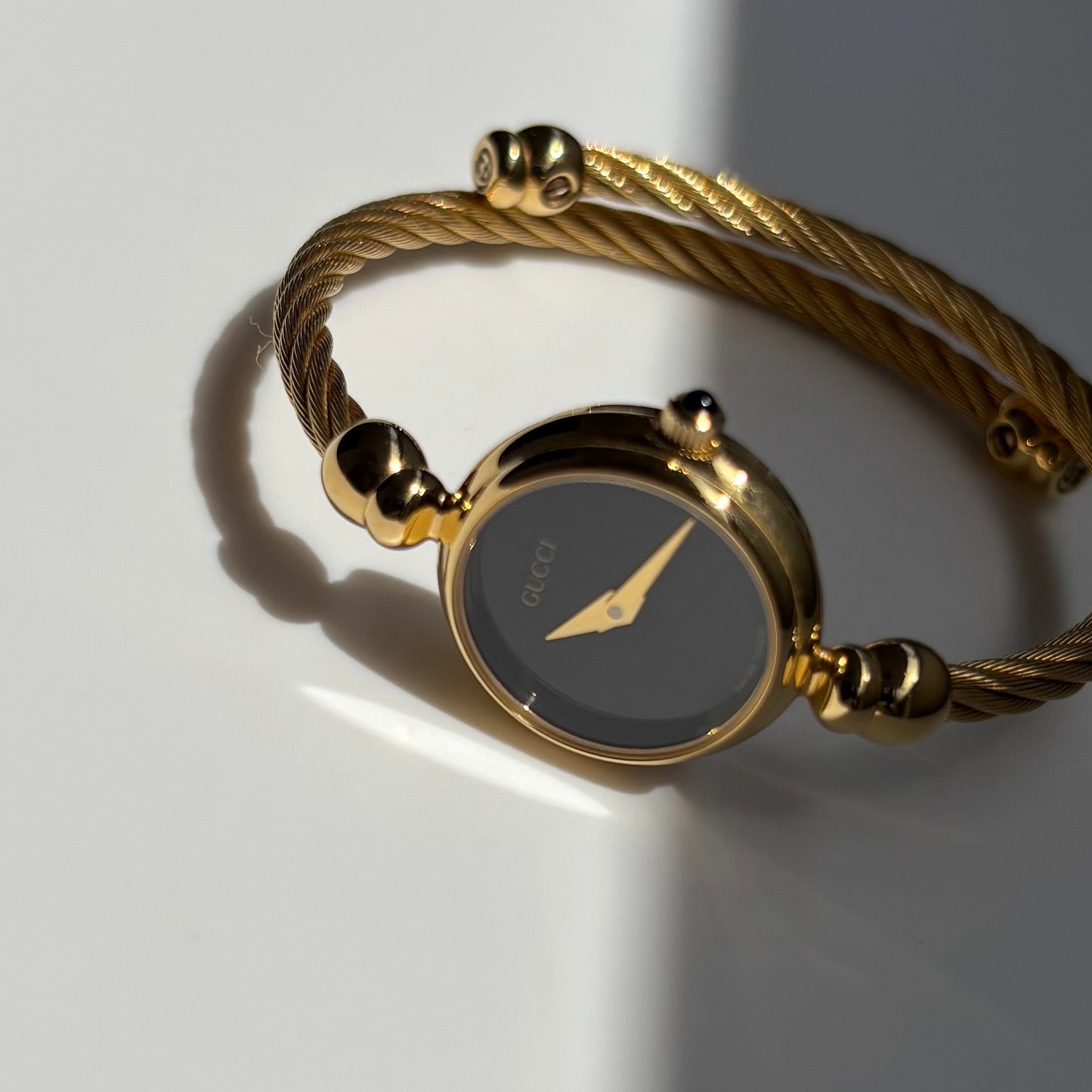 Gucci 1990s Black Dial Gold Plated Cable Bangle Watch