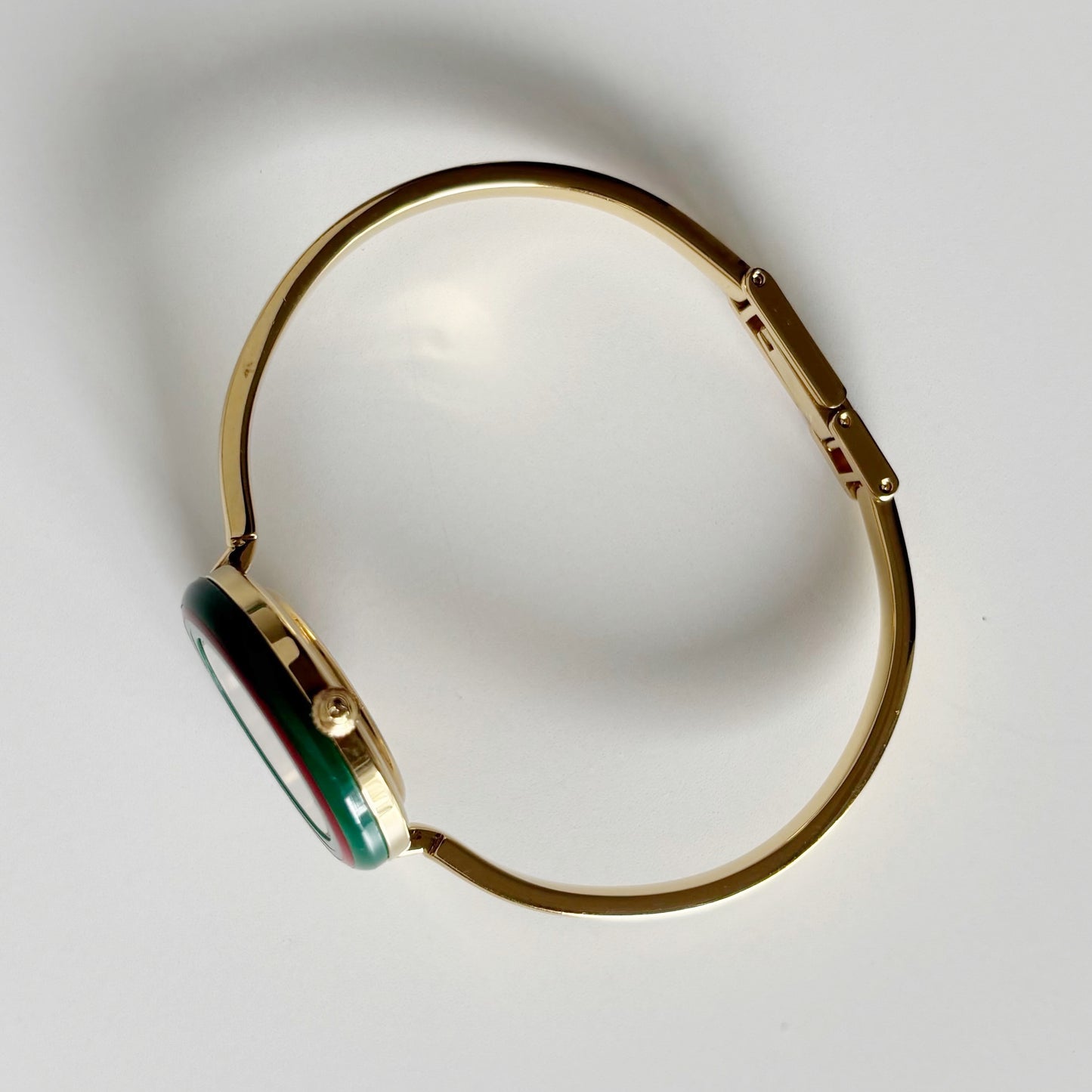 Gucci 1990s Interchangeable Bezel Gold Plated Bangle Watch with 12 bezels, case