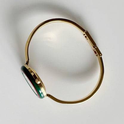 Gucci 1990s Interchangeable Bezel Gold Plated Bangle Watch with 12 bezels, case
