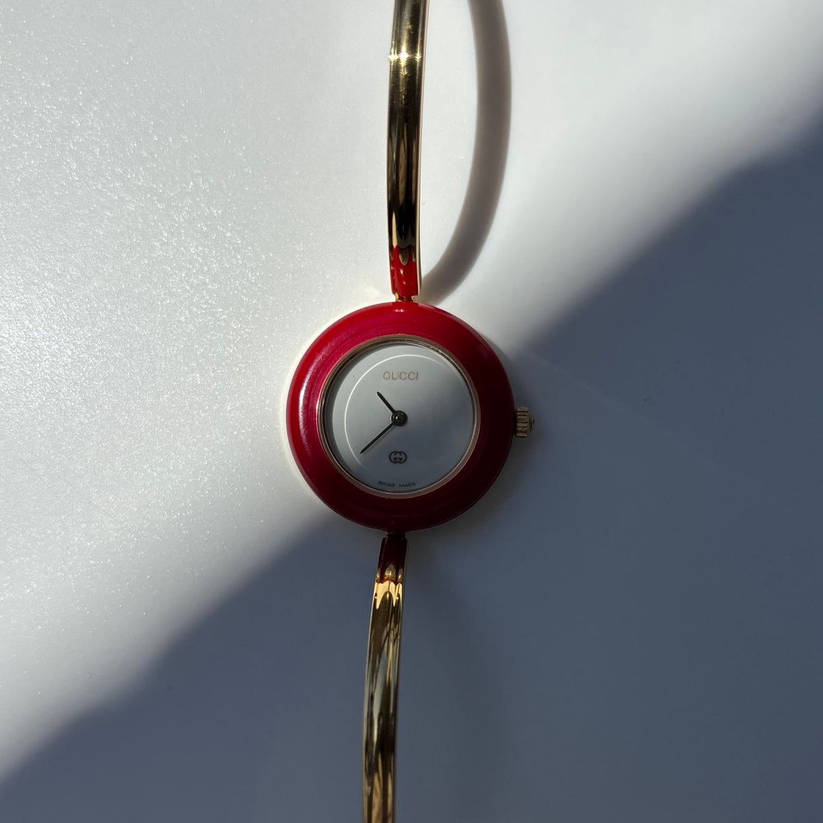 Gucci 1990s Interchangeable Bezel Gold Plated Bangle Watch with 12 bezels, case