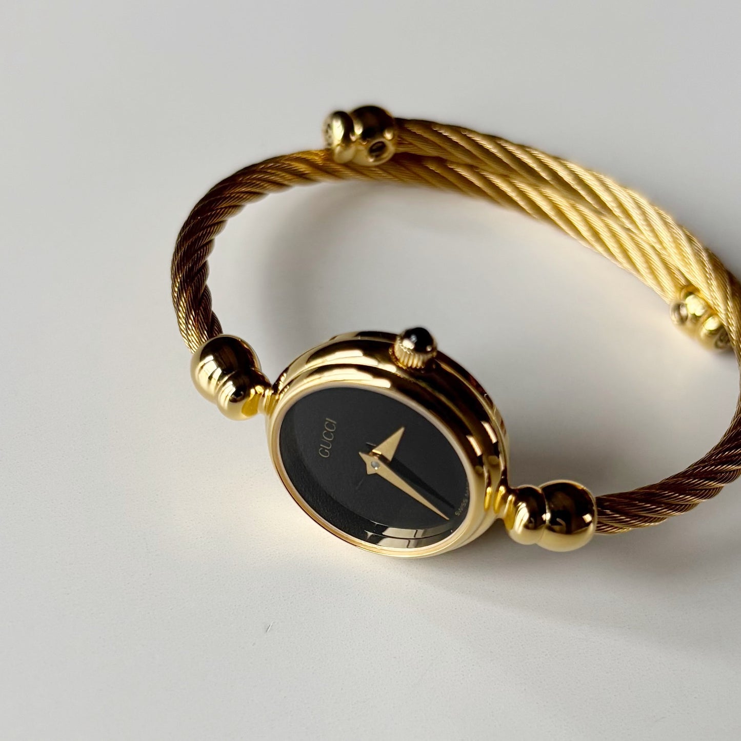 Gucci 1990s Black Dial Gold Plated Cable Bangle Watch