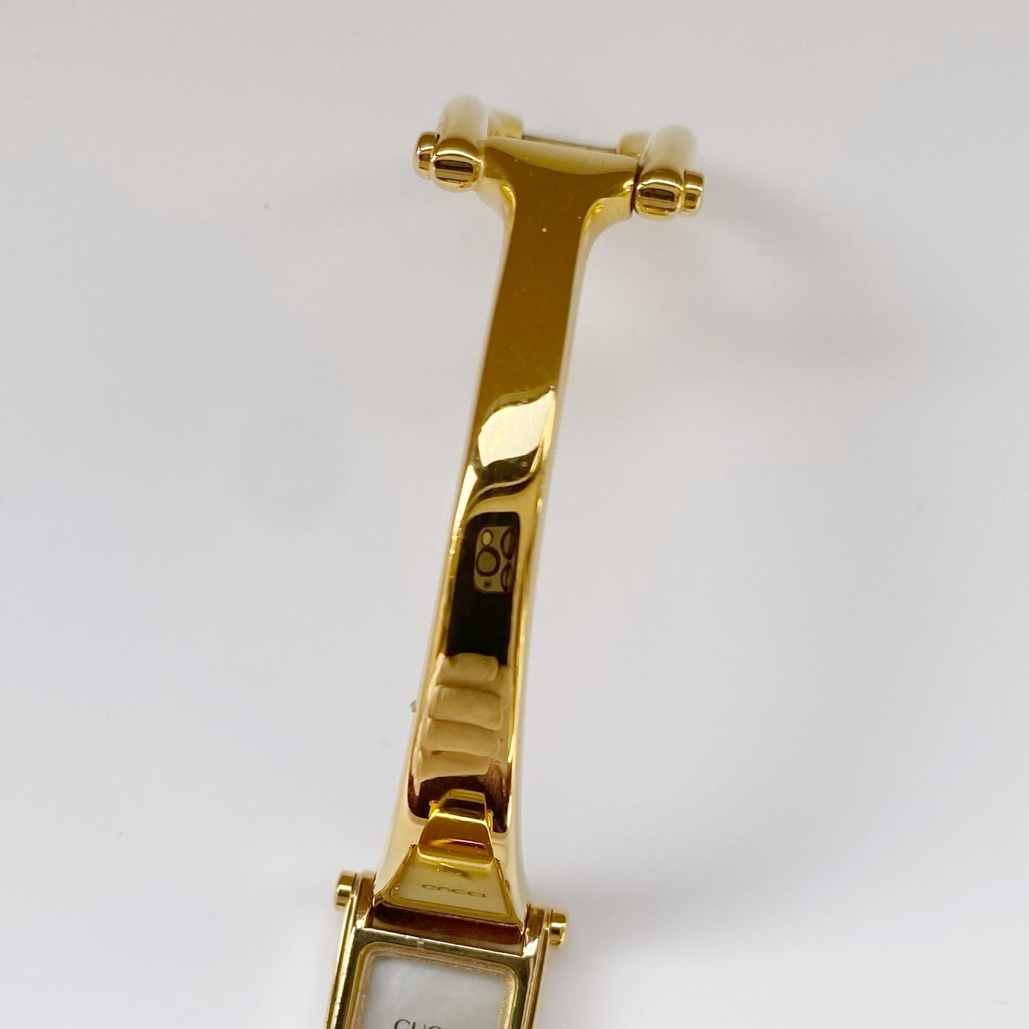 Gucci 1990s Rectangular Seashell Dial Gold Plated Bangle Watch