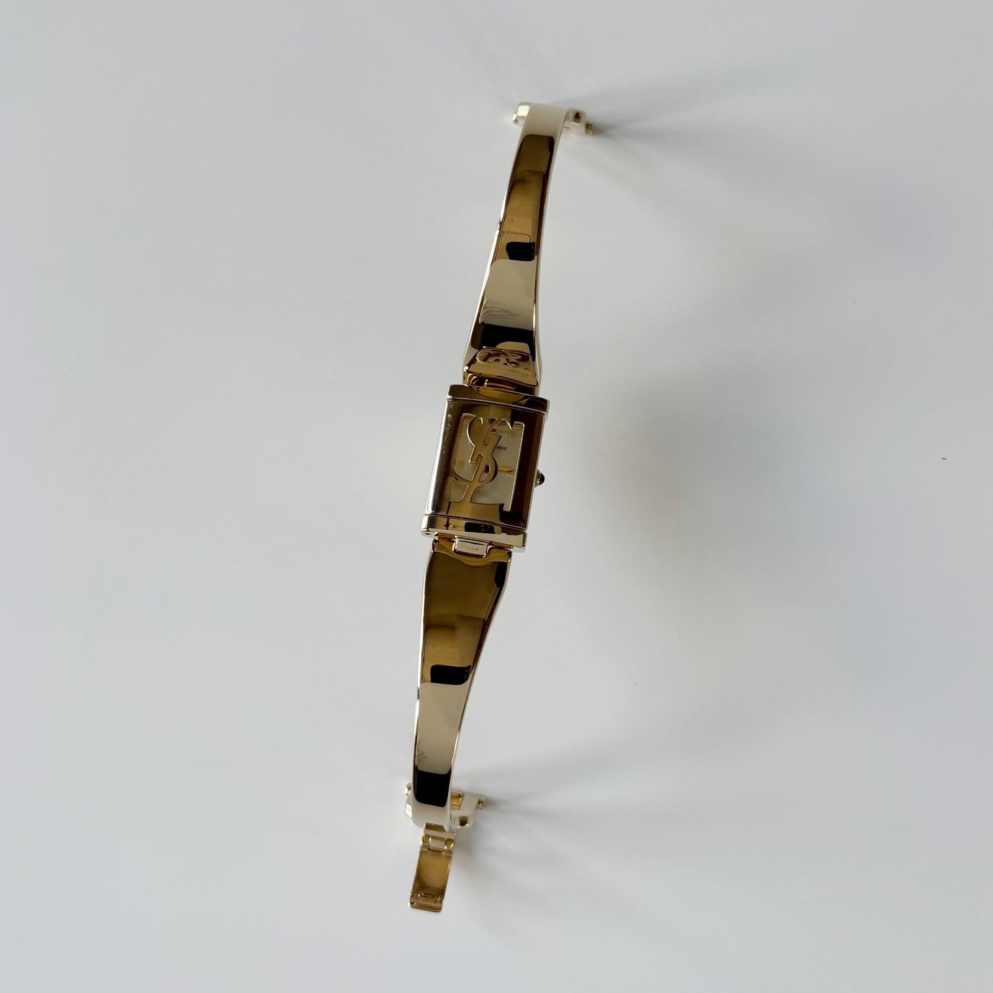 Yves Saint Laurent 1990s Peek-A-Boo Gold Plated Bangle Watch