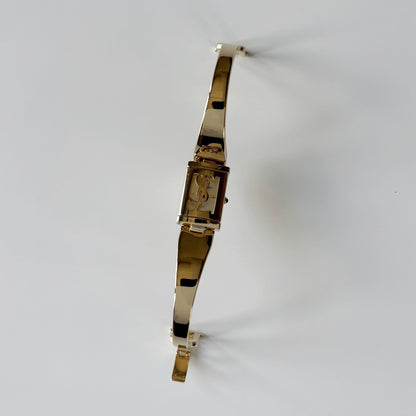 Yves Saint Laurent 1990s Peek-A-Boo Gold Plated Bangle Watch