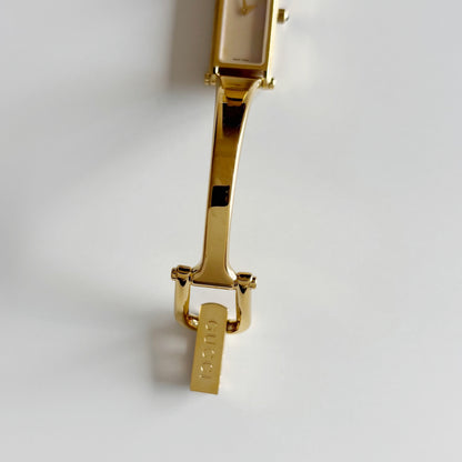 Gucci 1990s Seashell Dial Gold Plated Bangle Watch