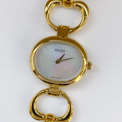 Gucci 1990s Seashell Dial Oval Gold Plated Bangle Watch