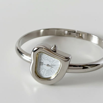 Yves Saint Laurent 1990s Heart Shaped Dial Silver Bangle Watch