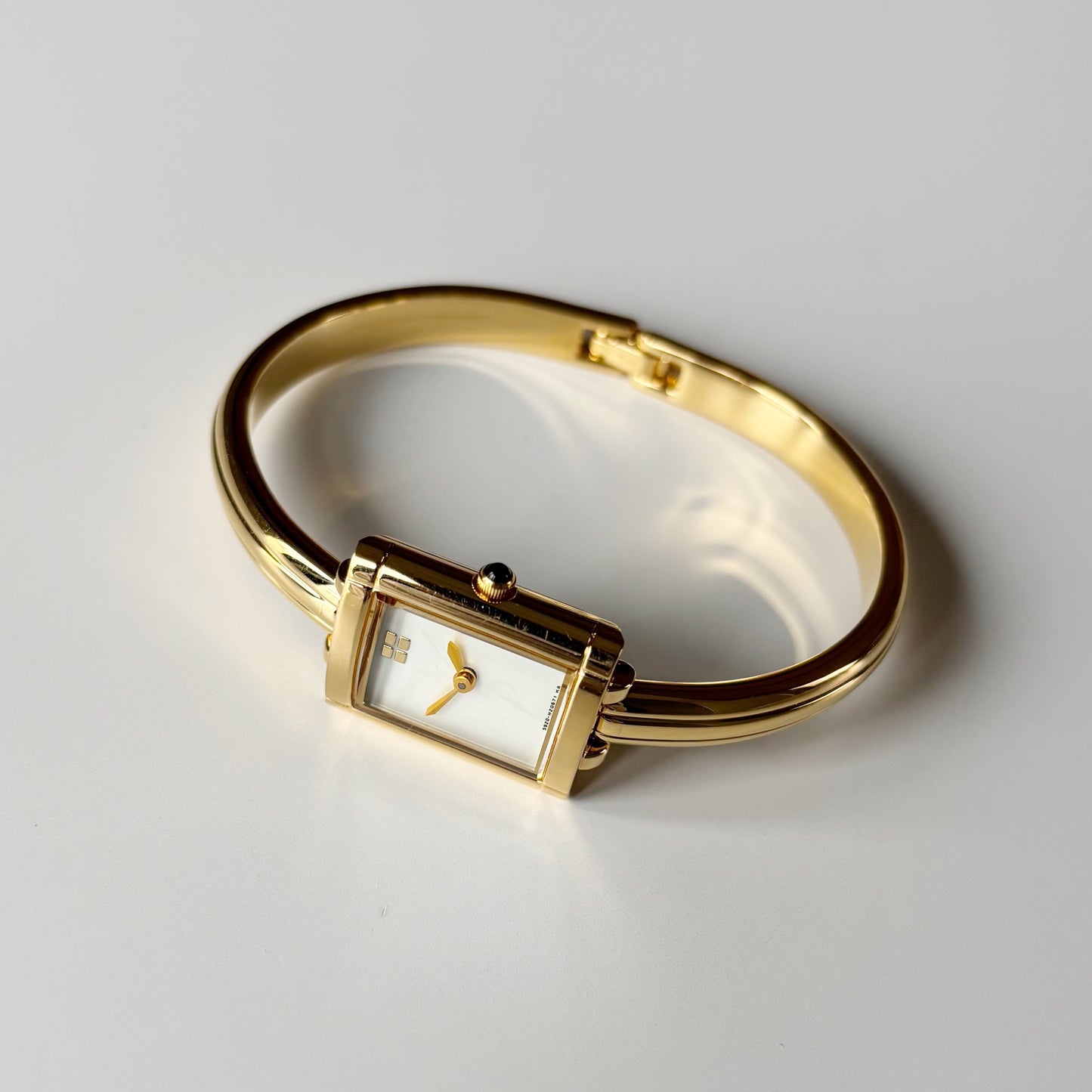 Yves Saint Laurent 1990s Seashell Dial Gold Plated Bangle Watch