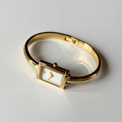 Yves Saint Laurent 1990s Seashell Dial Gold Plated Bangle Watch