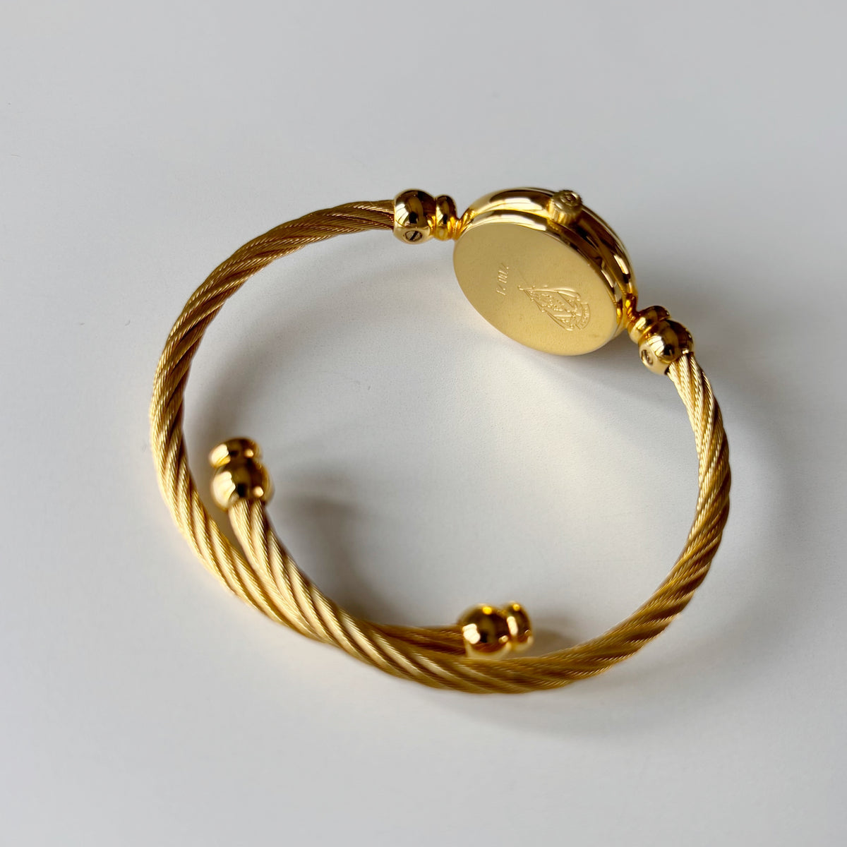 Gucci 1990s Seashell Dial Gold Plated Cable Bangle Watch