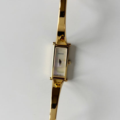 Gucci 1990s Seashell Rectangular Dial Gold Plated Bangle Watch