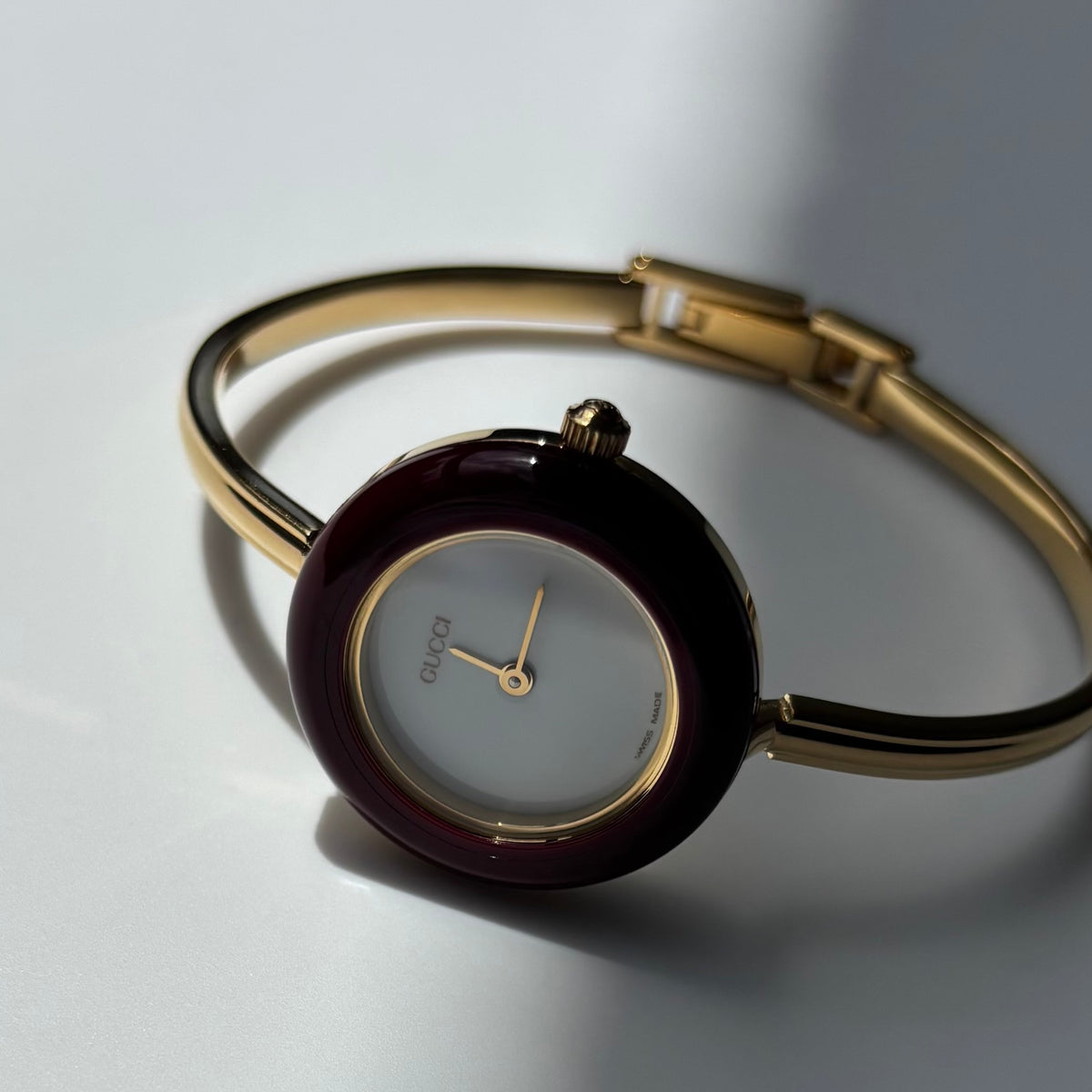 Gucci 1990s Interchangeable Bezel Gold Plated Bangle Watch with 12 bezels, case