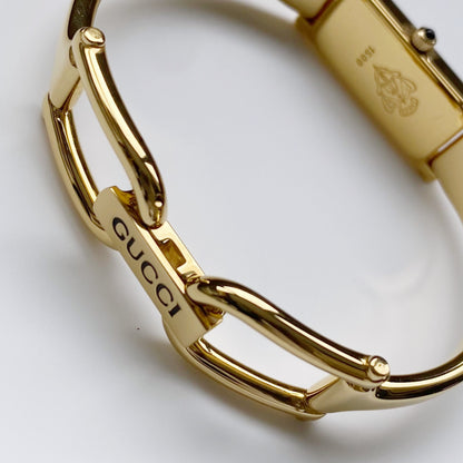 Gucci 1990s Gold Dial Gold Plated Rectangular Bangle Watch