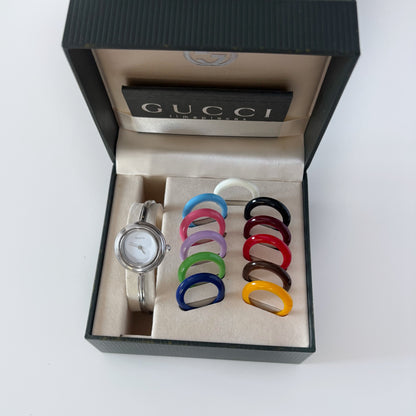 Gucci 1990s Interchangeable Bezel Stainless steel Bangle Watch with 12 bezels, case