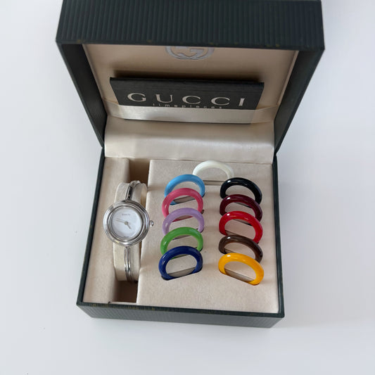 Gucci 1990s Interchangeable Bezel Stainless steel Bangle Watch with 12 bezels, case