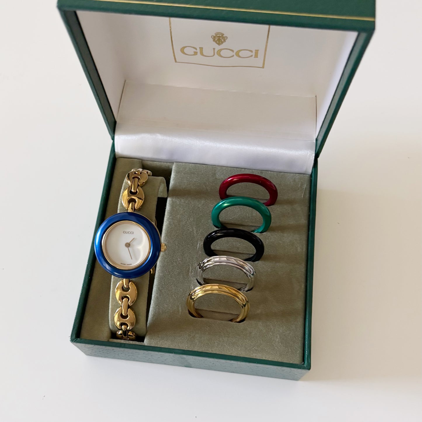 Gucci 1990s Interchangeable Bezel Gold Plated Watch with case, 6 bezels