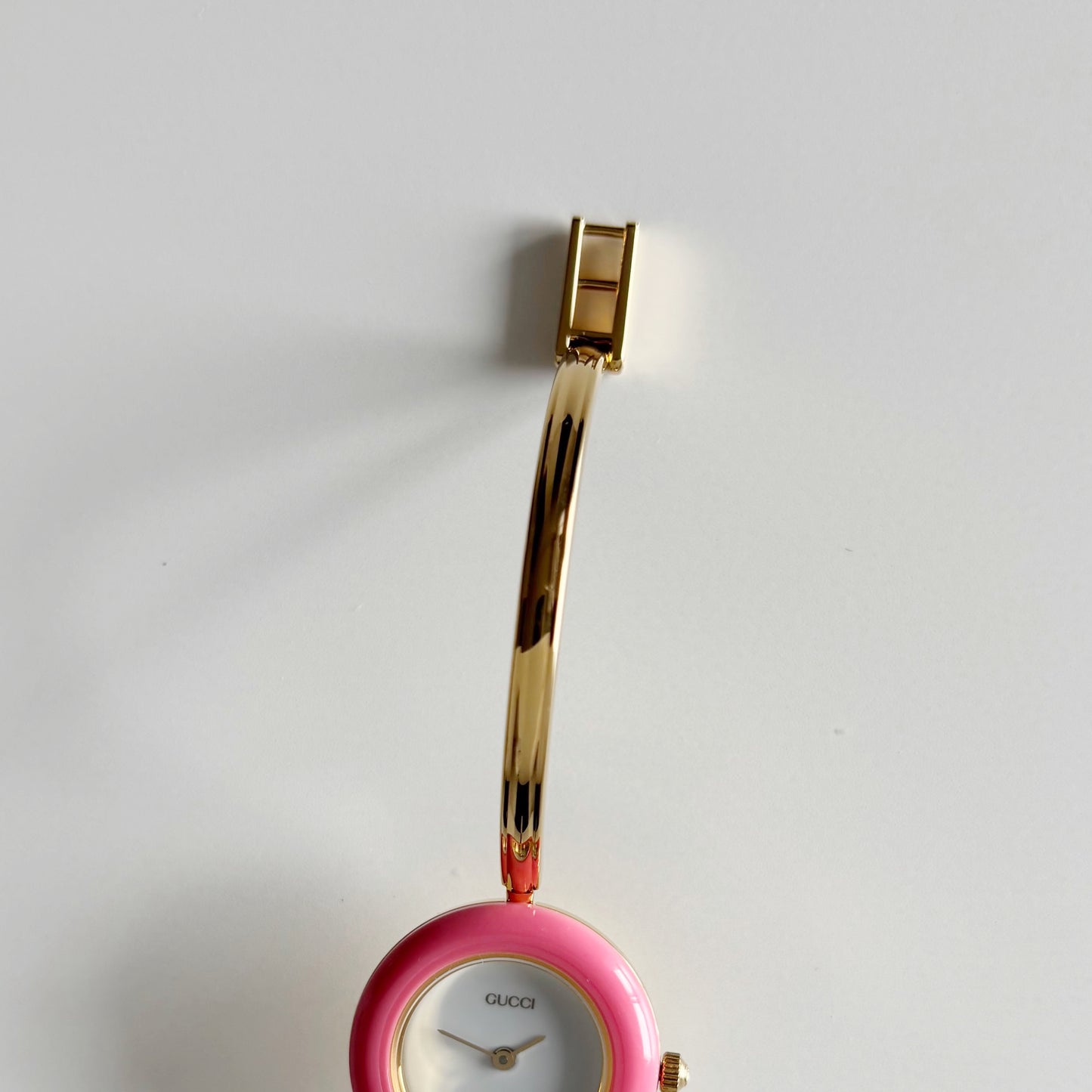 Gucci 1990s Interchangeable Bezel Gold Plated Bangle Watch with 12 bezels, case