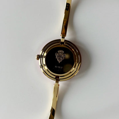 Gucci 1990s Interchangeable Bezel Gold Plated Bangle Watch with case, 12 bezels