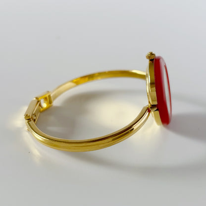Gucci 1990s Interchangeable Bezel Gold Plated Bangle Watch with 12 bezels, case (Small)