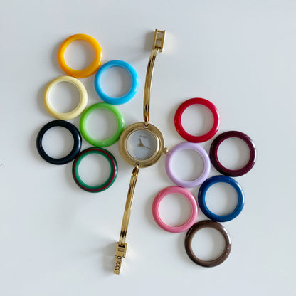 Gucci 1990s Interchangeable Bezel Gold Plated Bangle Watch with 12 bezels, case (Small)