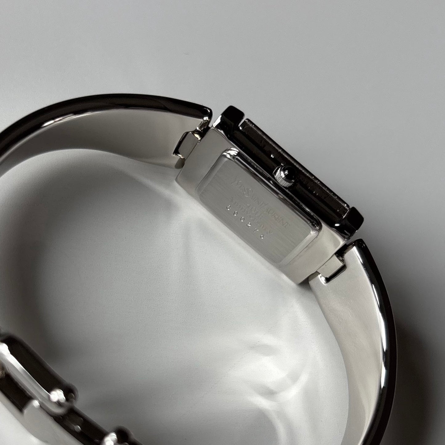 Yves Saint Laurent 1990s Black Dial Silver Bangle Watch