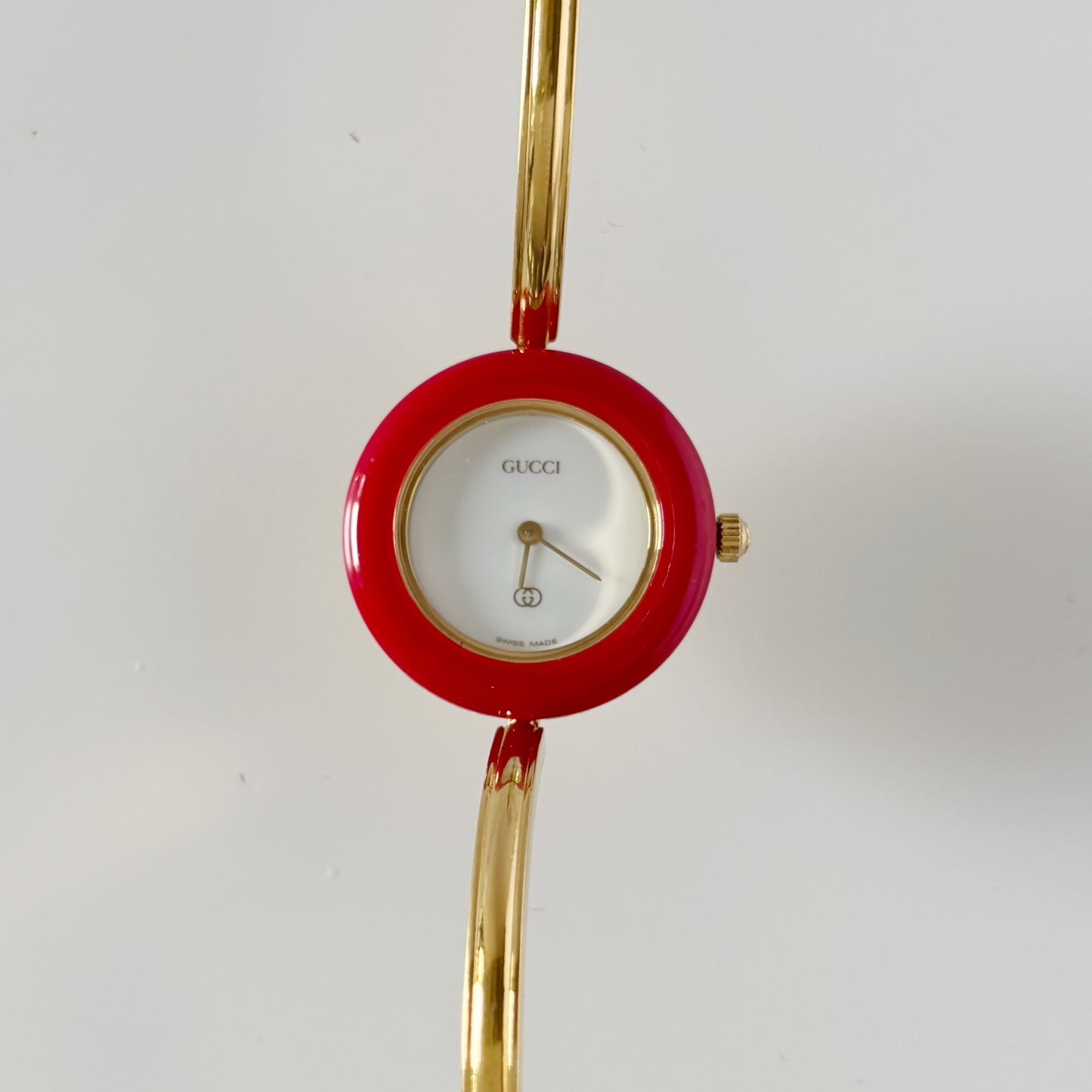 Gucci 1990s Interchangeable Bezel Gold Plated Bangle Watch with 12 bezels, case