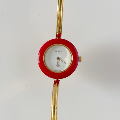 Gucci 1990s Interchangeable Bezel Gold Plated Bangle Watch with 12 bezels, case