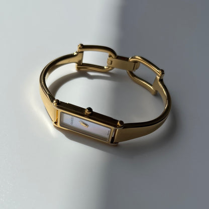 Gucci 1990s Seashell Dial Rectangular Gold-Plated Bangle Watch
