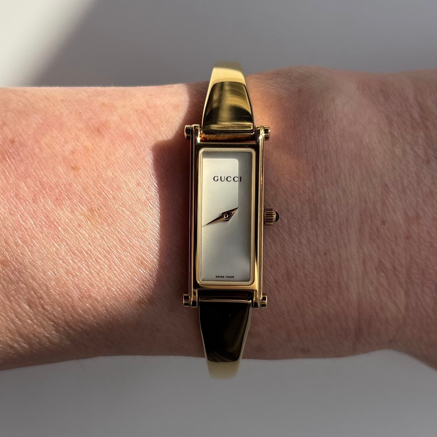 Gucci 1990s Seashell Rectangular Dial Gold Plated Bangle Watch (Small)