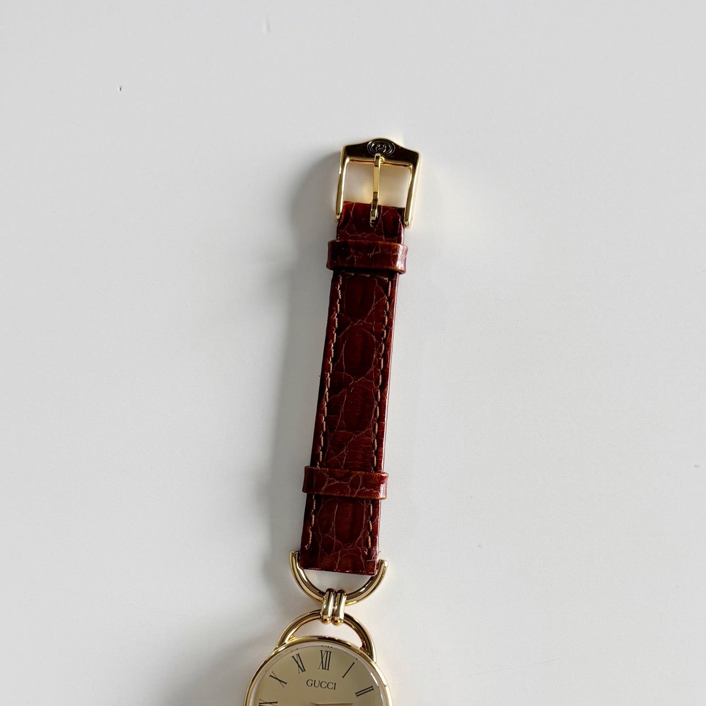 Gucci 1990s Round Dial Horsibit Gold Plated Watch