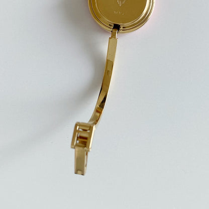 Gucci 1990s Interchangeable Bezel Gold Plated Bangle Watch with 12 bezels, case (Small)