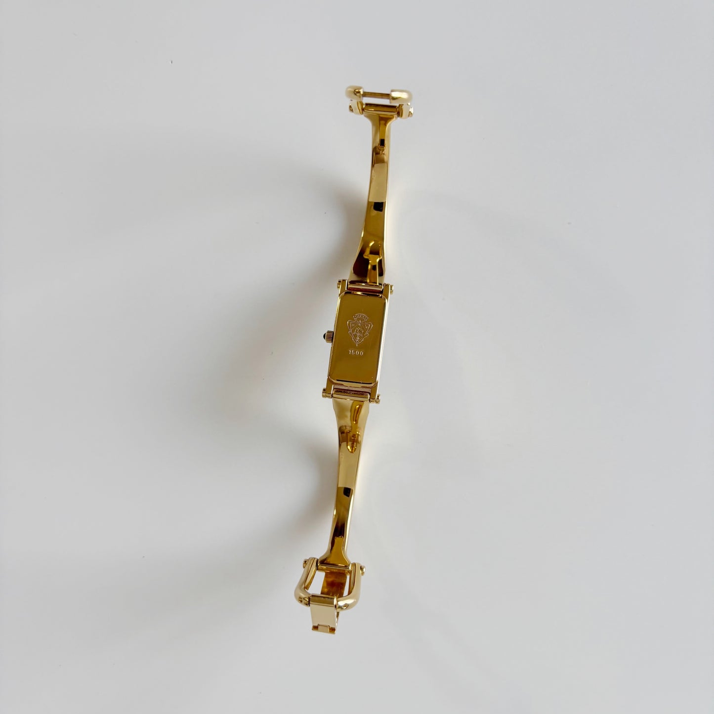 Gucci 1990s Black Dial Rectangular Gold Plated Bangle Watch