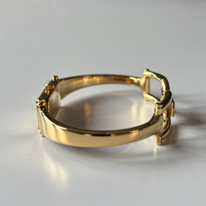 Gucci 1990s Gold Rectangular Dial Gold Plated Bangle Watch