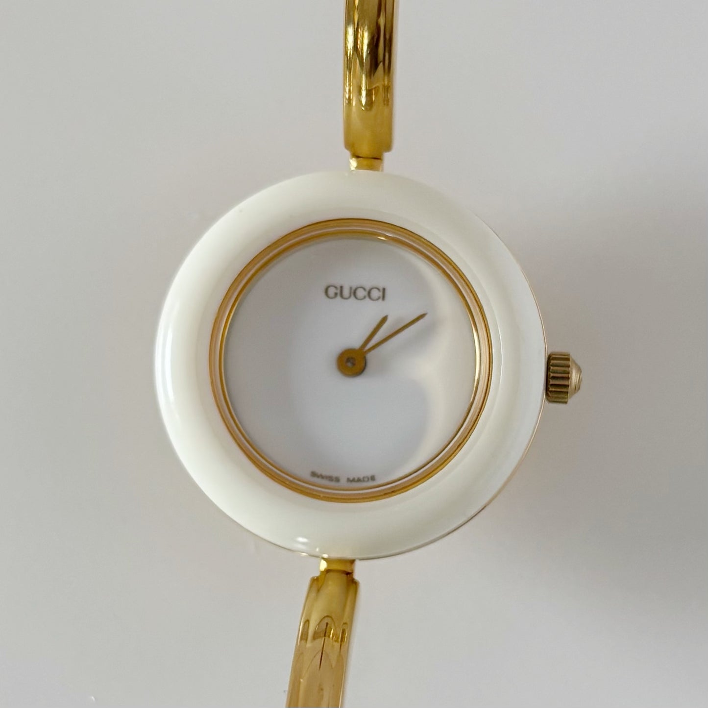 Gucci 1990s Interchangeable Bezel Gold Plated Bangle Watch with 12 bezels, case