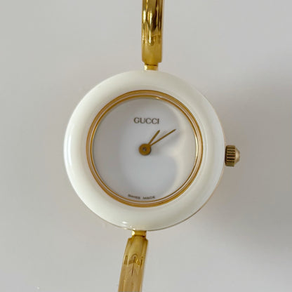 Gucci 1990s Interchangeable Bezel Gold Plated Bangle Watch with 12 bezels, case