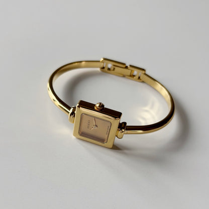 Gucci 1990s Square Dial Gold Plated Bangle Watch