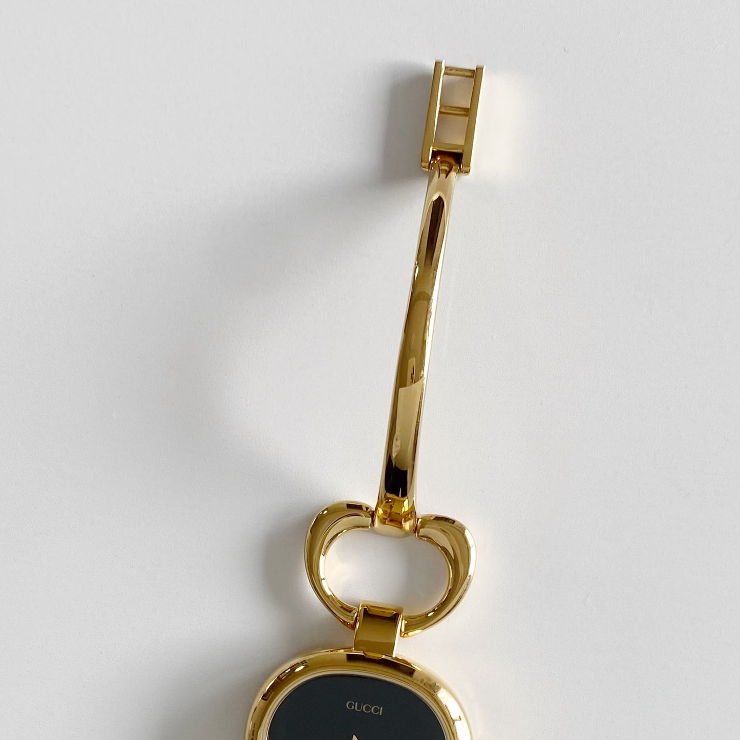 Gucci 1990s Black Dial Gold Plated Bangle Watch