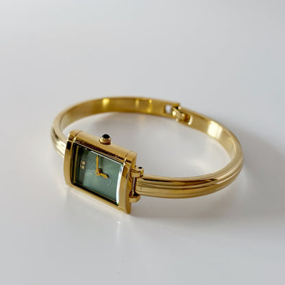 Yves Saint Laurent 1990s Gold Plated Bangle Watch