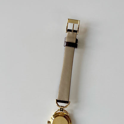 Gucci 1990s Gold Round Dial Horsebit Gold Plated Watch