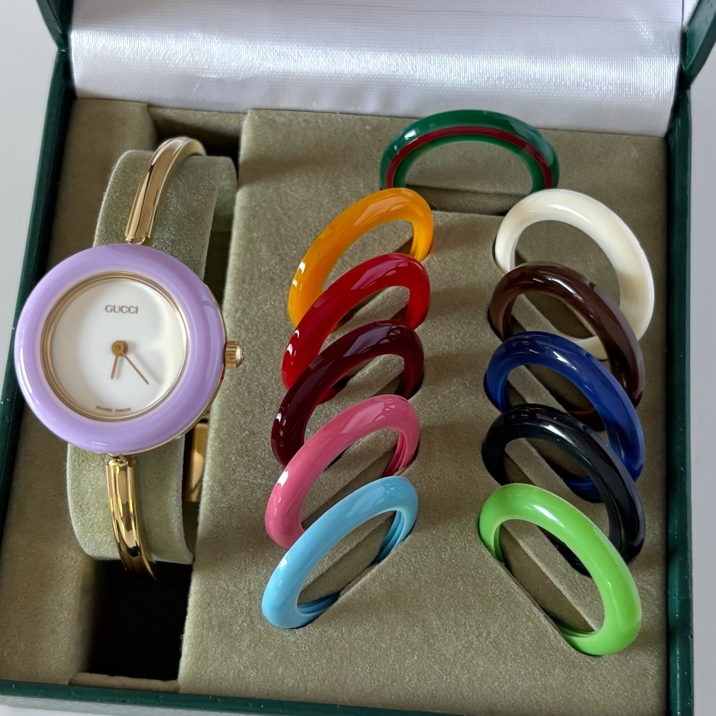 Gucci 1990s Interchangeable Bezel Gold Plated Bangle Watch with 12 bezels, case