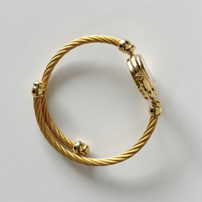 Gucci 1990s Black Dial Gold Plated Cable Band Bangle Watch