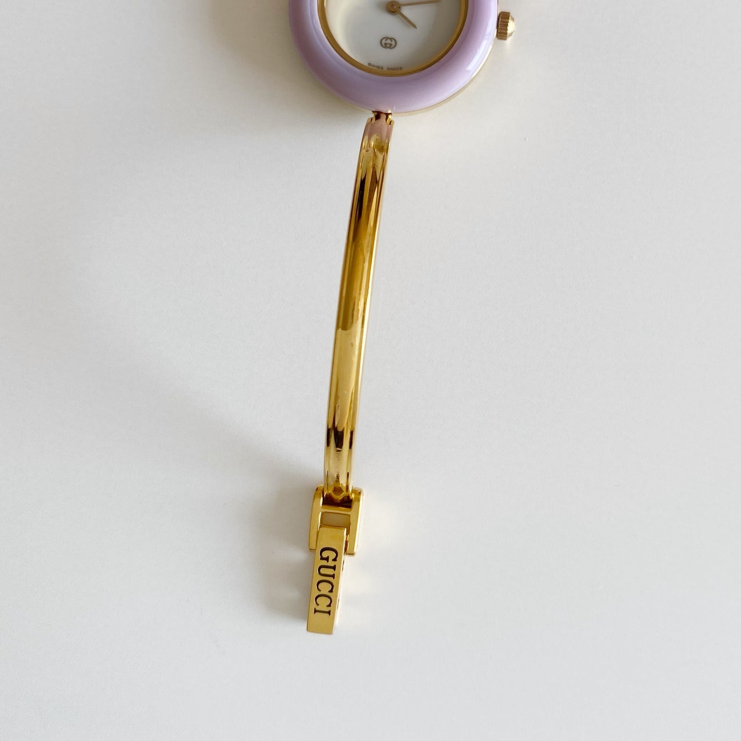 Gucci 1990s Interchangeable Bezel Gold Plated Bangle Watch with 12 bezels, case