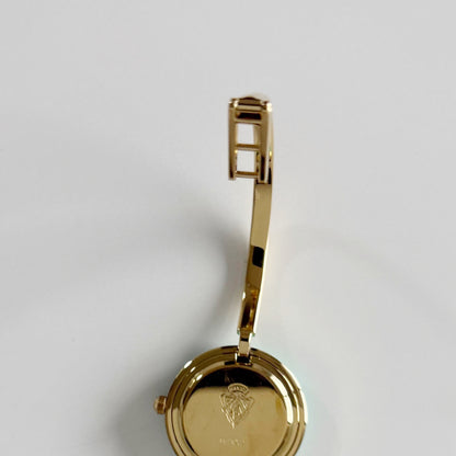 Gucci 1990s Interchangeable Bezel Gold Plated Bangle Watch with 12 bezels, case