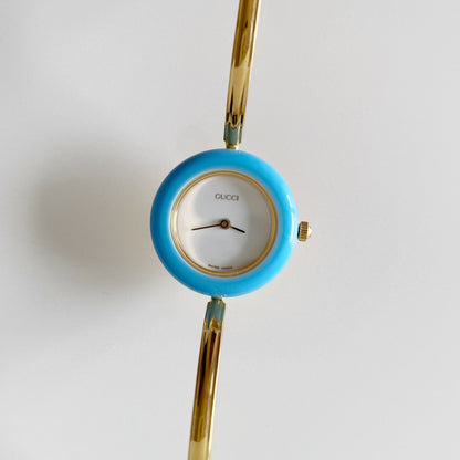 Gucci 1990s Interchangeable Bezel Gold Plated Bangle Watch with 12 bezels, case