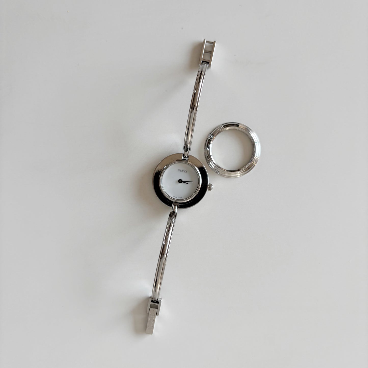 Gucci 1990s Interchangeable Bezel Stainless steel Bangle Watch with 12 bezels, case (Small)