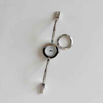 Gucci 1990s Interchangeable Bezel Stainless steel Bangle Watch with 12 bezels, case (Small)