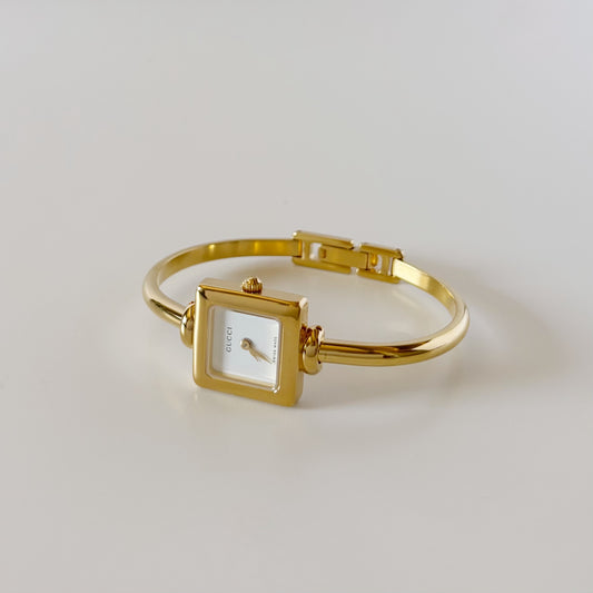 Gucci 1990s Square Dial Gold Plated Bangle Watch