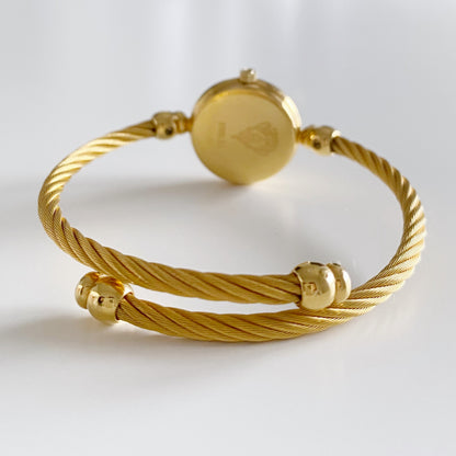 Gucci 1990s Seashell Dial Gold Plated Bangle Watch