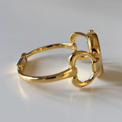 Gucci 1990s Oval Gold Dial Gold Plated Bangle Watch (Small)