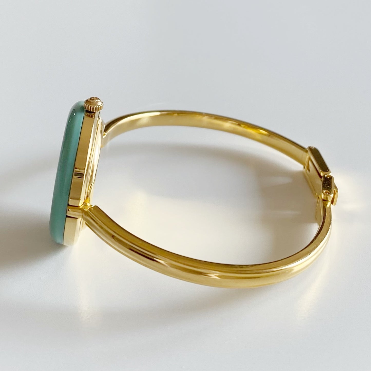 Gucci 1990s Interchangeable Bezel Gold Plated Bangle Watch with 12 bezels, case